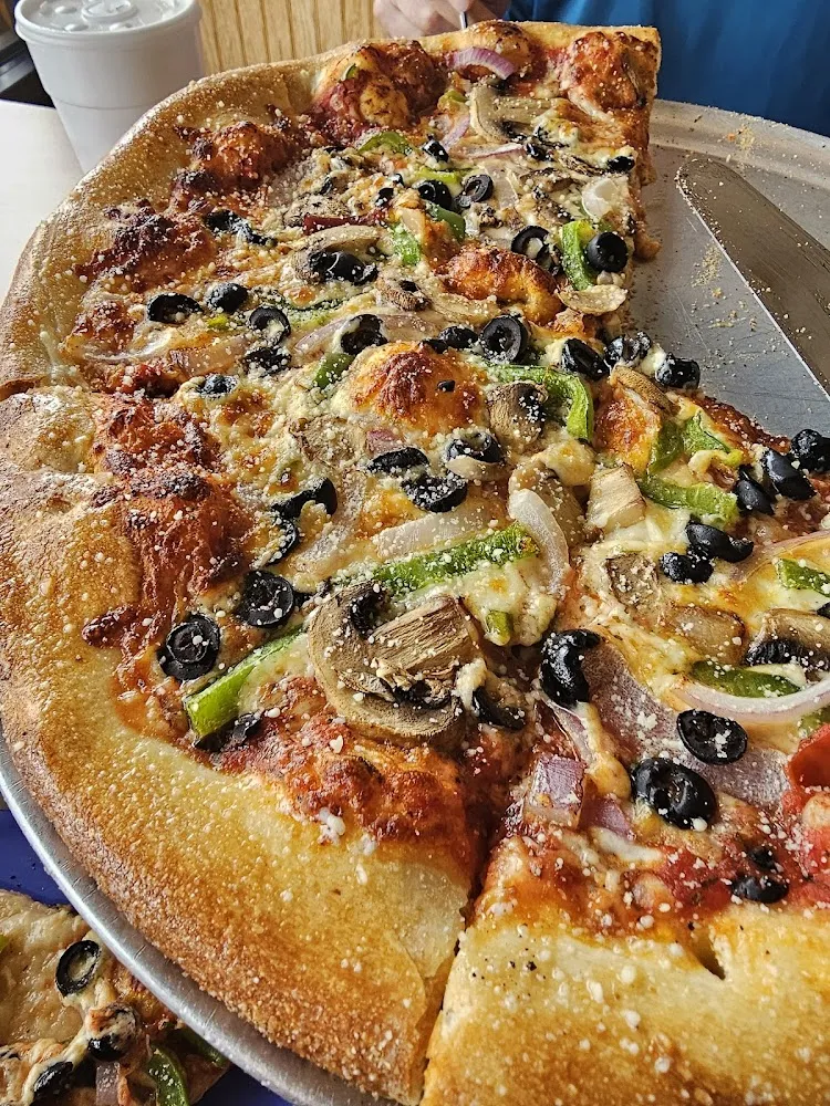 Med Size Pizza Light Sauce Well Done with Mushrooms Onions Green Pepper Black Olives